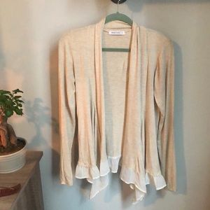 Small Cream Colored Cardigan with White Ruffle